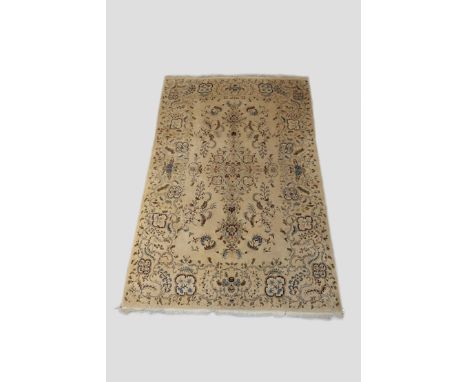 Kashan carpet, west Persia, circa 1950s, 10ft. 11in. x 7ft. 3.33m. x 2.13m. Five colour Kashan with floral design on an ivory