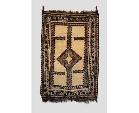 Two gabbeh rugs, south west Persia, circa 1930s, the first 5ft. 8in. X 3ft. 10in. 1.73m. X 1.17m. Central geometric medallion