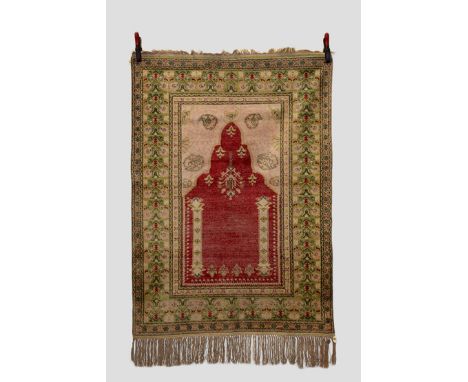 Two Anatolian rugs, the first: Kayserie 'art' silk(?)prayer rug, north central Anatolia, late 19th/early 20th century, 5ft. X