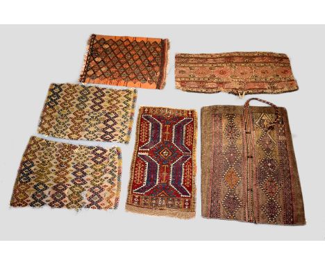 An eclectic collection of weavings suitable for cushion making comprising: group of three rugs, viz: a Baluchi rug, Khorasan,