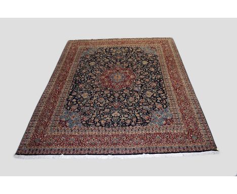 Kerman carpet, south east Persia, circa 1960s, 16ft. 5in. X 13ft. 5m. 5m. X 3.96m. Leatherette strips to each selvedge. Dark 