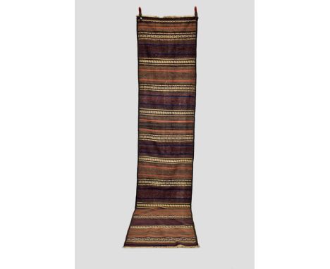 Narrow Baluchi brocaded flatweave runner, Khorasan, north east Persia, first half 20th century, 11ft. 7in. X 2ft. 6in. 3.53m.