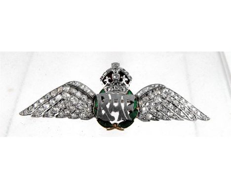 A Diamond and enamel RAF sweetheart brooch in yellow and white metal set with approx 86 diamonds 6cm wide (missing one diamon