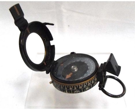 A WWII J.M. Glauser military black painted compass No. B1259 MK. IX. 1937 5.5cm diameter 