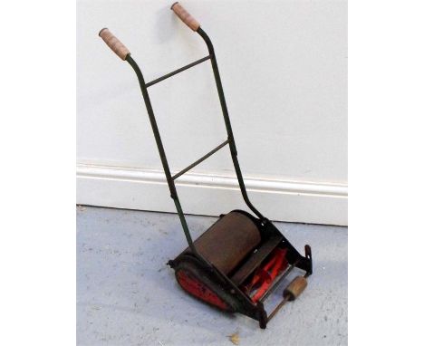 A Vintage Webb miniature childs push lawnmower 
