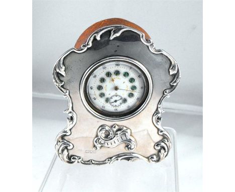 A Victorian silver mantle clock with Arabic numerals and subsidiary seconds, London 1882 11cm high 