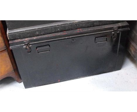 A large black painted tin trunk 91cm wide 