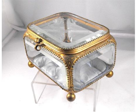 A 19thC French bevelled  glass trinket box with gilt metal mounts and cushioned silk interior 12.5cm x 9.5cm 
