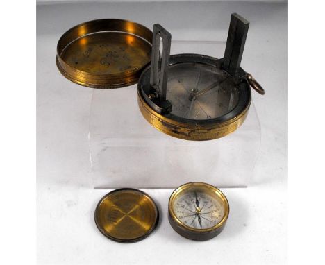 A 19thC Lutz & Schulz Aires circumferentor, surveyor's compass with silver dial in a brass case, 7.5cm diameter and a 19thC b