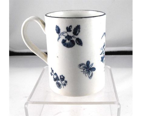An 18thC Doctor Wall period Worcester mug, of cylindrical straight sided form decorated flowers in underglaze blue with blue 