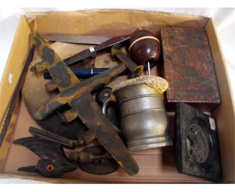 A Bakelite table lighter,a scratch built wooden war plane, a tin plate decorated a cat and other items 