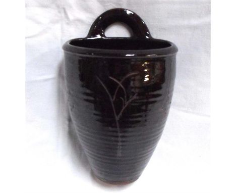Michael Cardew (1901-1983) A Winchcombe Pottery terracotta wall pocket, incised with grass stem design, impressed marks 23cm 