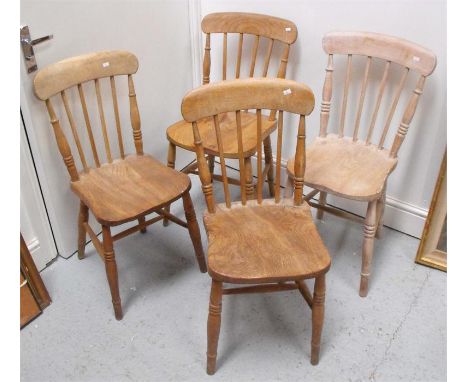 A set of four elm stick back kitchen chairs 