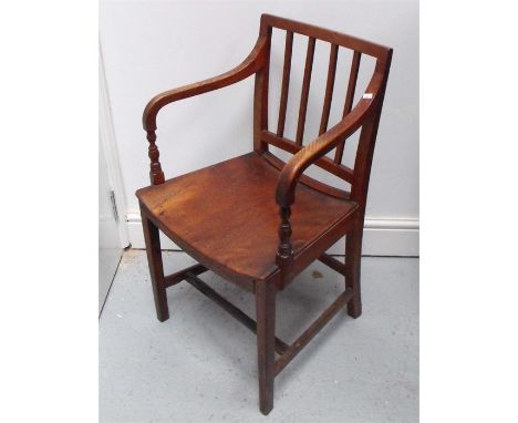 An early 19thC elm country carver chair Condition ReportCouple of splits to the front of the seat,Patch to front left corner 