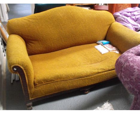 A late 19thC drop arm sofa on ball and claw feet 180cm wide 