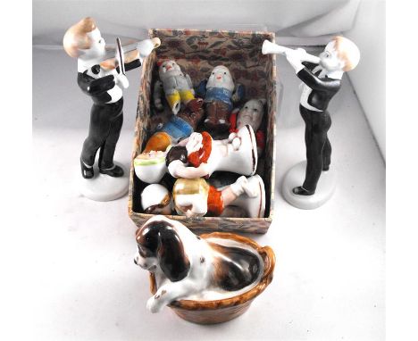 A Royal Doulton figure, puppy in a basket, HM2586 and other ceramic figures including 6 snow white bisque dwarves 