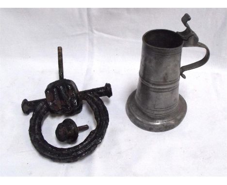 An 18thC pewter tankard initialled "IIF" and dated 1678 14.5cm high (A/F) and a regency cast iron hand and horse shoe door kn