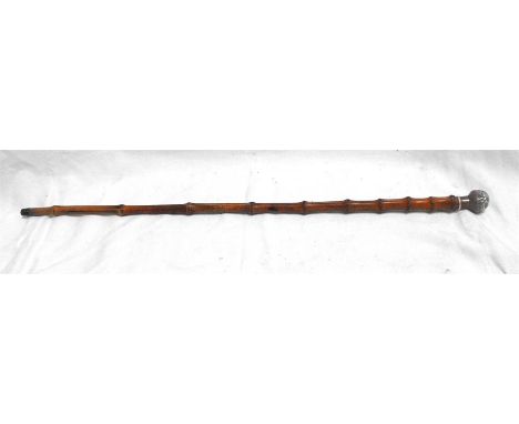 A rare WWI cane swagger stick with metal top having the badge of the Royal Guernsey Light Infantry 66cm long 