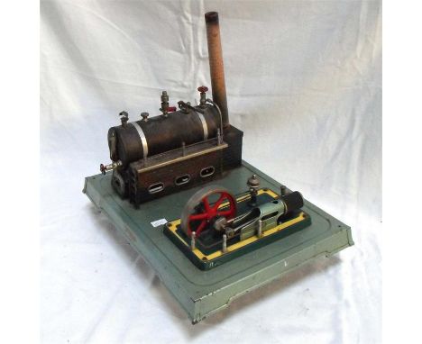 A Vintage German tin plate steam engine and boiler 26cm x 34cm 
