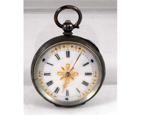 A late 19thC pocket fob watch the enamel dial having Roman numerals and gilt decoration in a silver case 4cm diameter 
