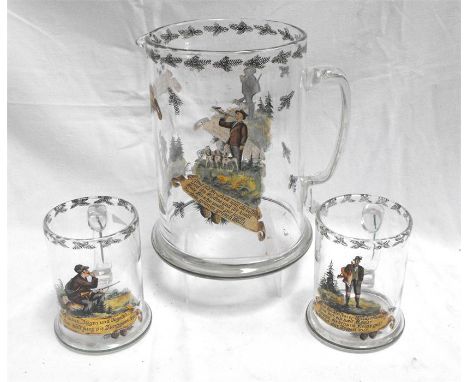 A large German glass jug with ground out pontil mark decorated hunting scenes, and a pair of matching tankards (3)