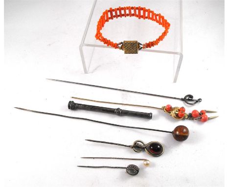 A 19thC stick coral bracelet, a pique hat pin, other hat pins and a propelling pencil 