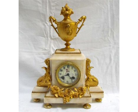 A Victorian mantle clock, the enamel dial being painted with flowers and having Arabic numerals in a white marble case with o