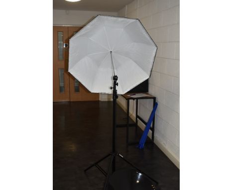 A selection of lighting equipment including a pair of Lastolite collapsable reflectors with tripod stands and three Lastolite