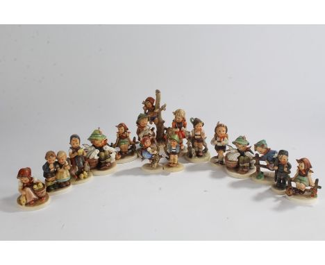Collection of Hummel porcelain figures, to include boy with rabbits, girl in a tree, girl with chick etc. (16