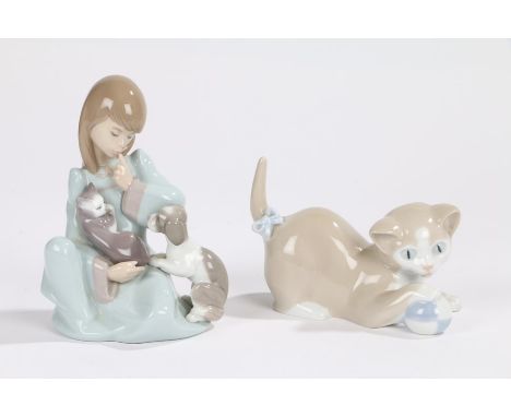 Lladro figure depicting a young girl cuddling a puppy and kitten, numbered 5640 to base, 14cm high, Nao figure depicting a ki