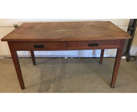 A vintage wooden 2 drawer desk. Approx 137cm x 76cm.
