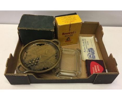 A box of misc items to include Agfa box camera and glass ashtrays with local advertising - Haulmix Conrete, Beeston.