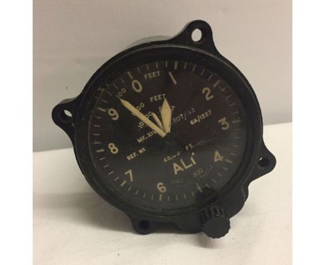 A vintage black bakelite altimeter for British Aircraft made by Smiths, Mk 4C with War Dept arrow.