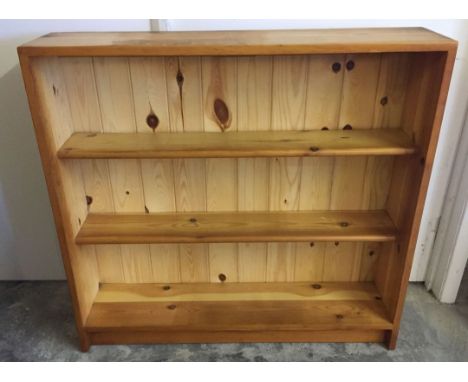 A modern pine shelf unit. 91 x 86cm approx.