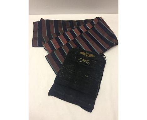 A WW2 blue leather pouch with Air Transport Auxillary pilots wings badge. Pouch possible for cutlery or shaving. Together wit