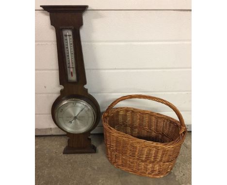 A vintage wall hanging oak framed barometer. Approx 66cm high.