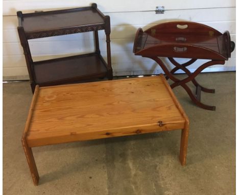 3 small items of furniture: a modern pine coffee table, a vintage dark wood tea trolley and a modern butlers tray style table