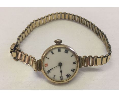 Ladies vintage watch with 9ct gold case and rolled gold bracelet. Total weight 24.5g.