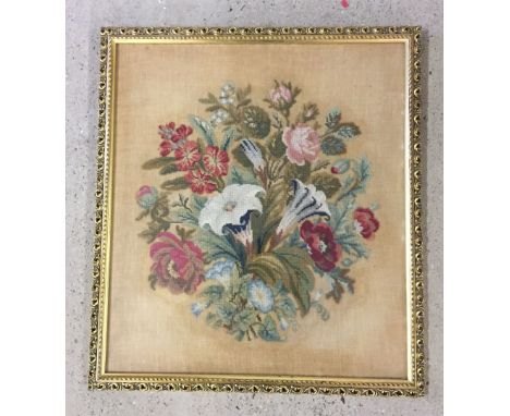 A gilt framed & glazed vintage embroidery of a floral spray frame size approx 45 x 50cm.