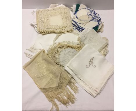 A vintage silk scarf and vintage linen & lace.