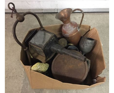 A box of mixed metalware to include coaching lamp a/f, cast iron doorstops and silver plate.