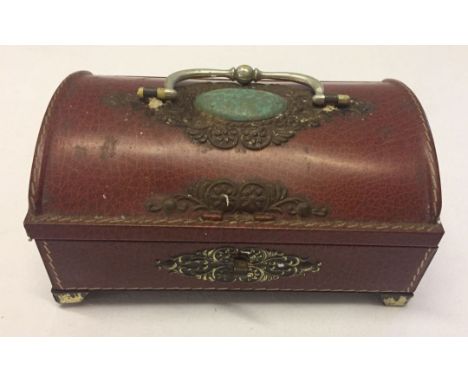 A vintage French sweet tin with cabouchon style decoration.