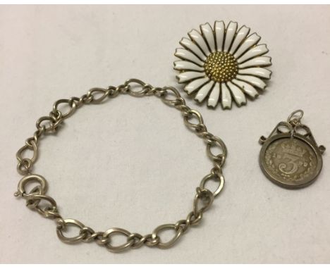 A George Jensen, Danish enamel & 925 silver gilt brooch in a daisy design - engraved on back 'Margrethe II 16 April 2000'.  T