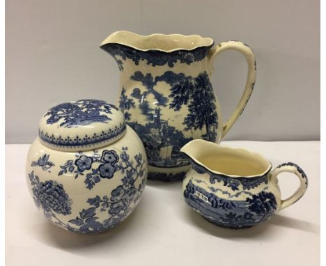 3 blue & white ceramic items: 2 Royal Worcester Avon scenes jugs together with a Masons lidded ginger jar.