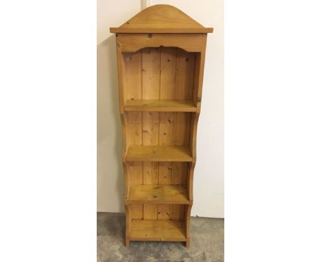 A small pine shelf unit. 39.5cm x 122cm.