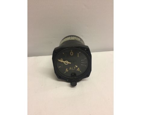 A vintage black bakelite altimeter for British Aircraft with Crown & AM mark.