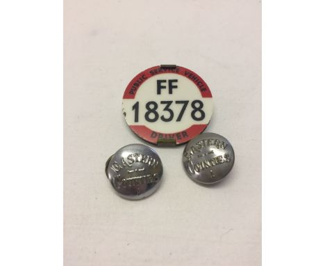 A vintage bus drivers badge together with 2 Eastern Counties bus buttons