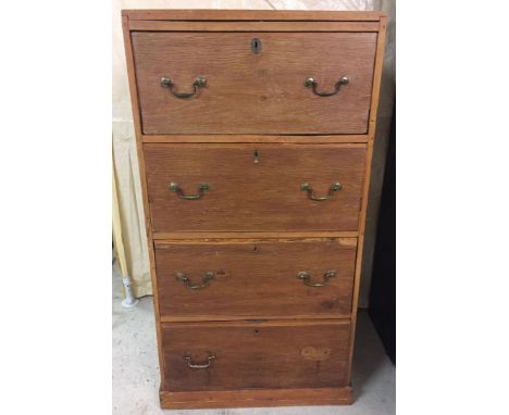 A vintage 4 drawer tall pine chest. Handle missing on bottom drawer. Approx 69 x 133cm.