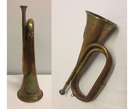 A vintage Arqyll & Sutherland Highlanders military bugle with Regimental badge to horn.