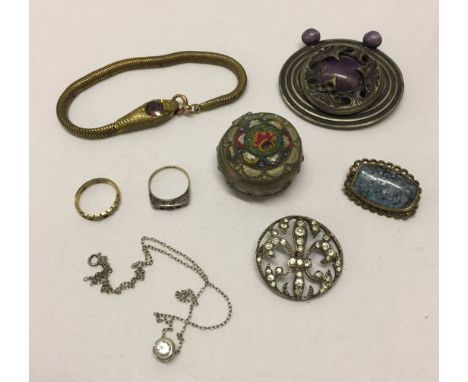 An assortment of vintage jewellery comprising  a snake, bracelet with amethyst stone inset in head, a silver pendant, 2 brooc